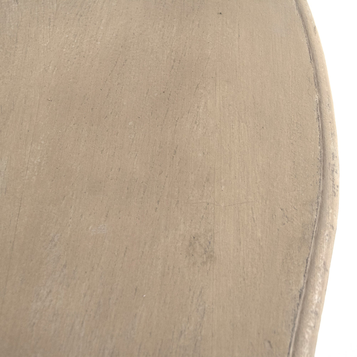 Close-up of the distressed cream finish on the top of the Abraham Rococo Carved Console Table