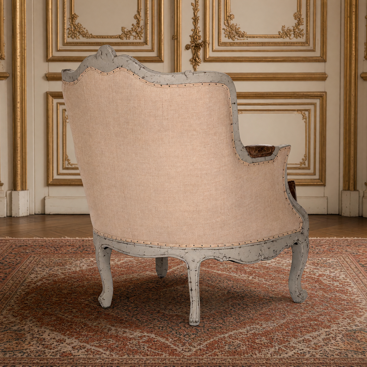 Adele French Carved Birch Leather Club Chair, back view showing the burlap outer back