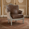 Adele French Carved Birch Leather Club Chair in top-grain leather and burlap, in a gilded French boiserie room