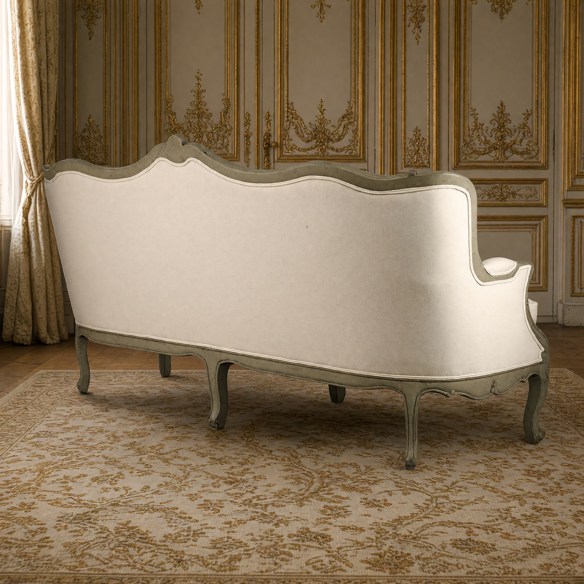 Back view of the Adele Carved French Cotton Sofa showing the cotton upholstered back and carved frame