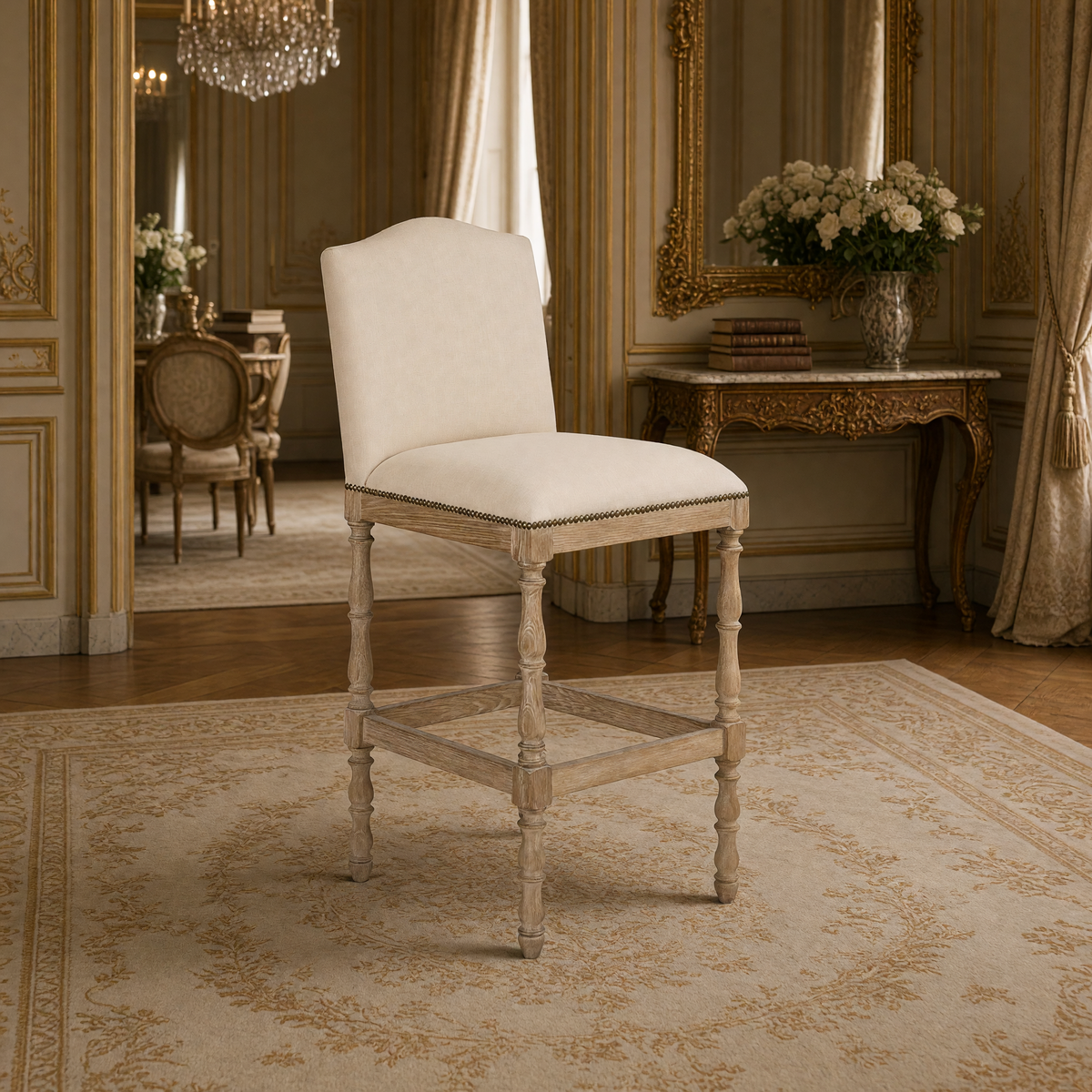 Aria French Turned Oak Bar Stool in Natural Linen, Recycled Oak, styled in a French salon with a marble-top console and gilded mirror