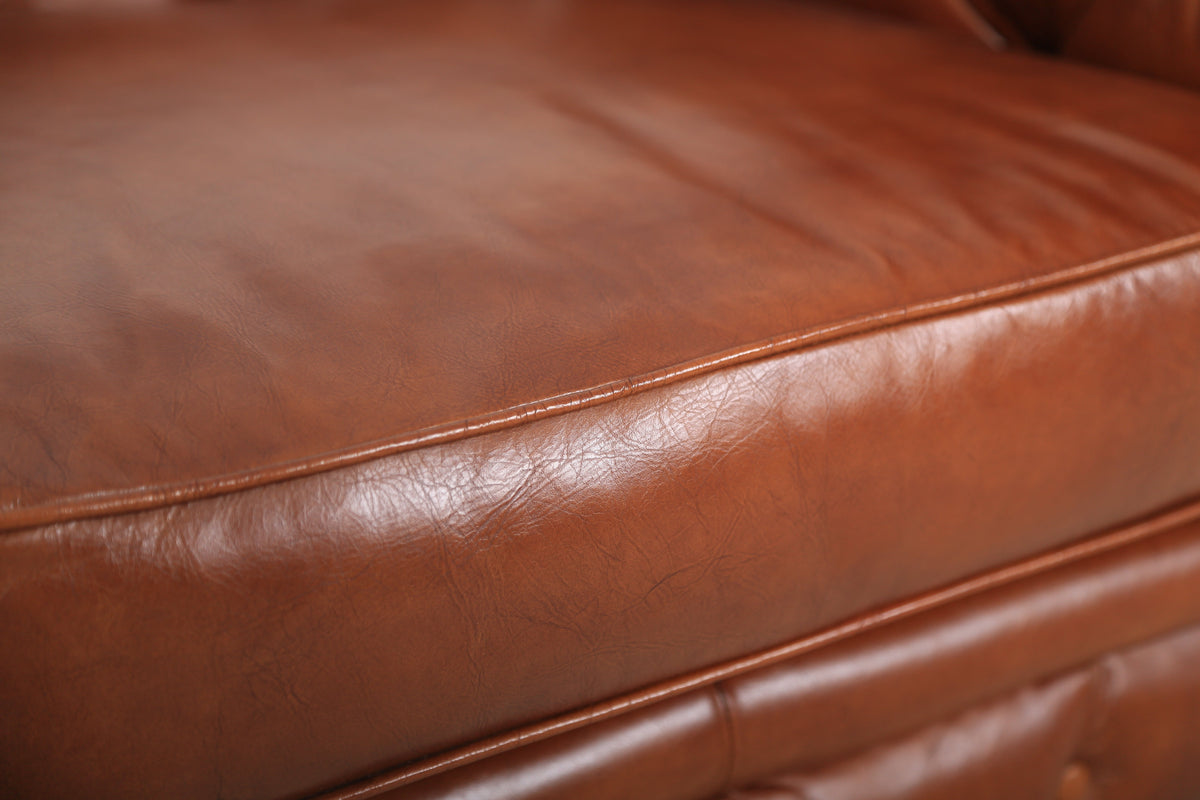 Close-up of the top-grain leather seat of the Arthur Chesterfield Leather Arm Chair