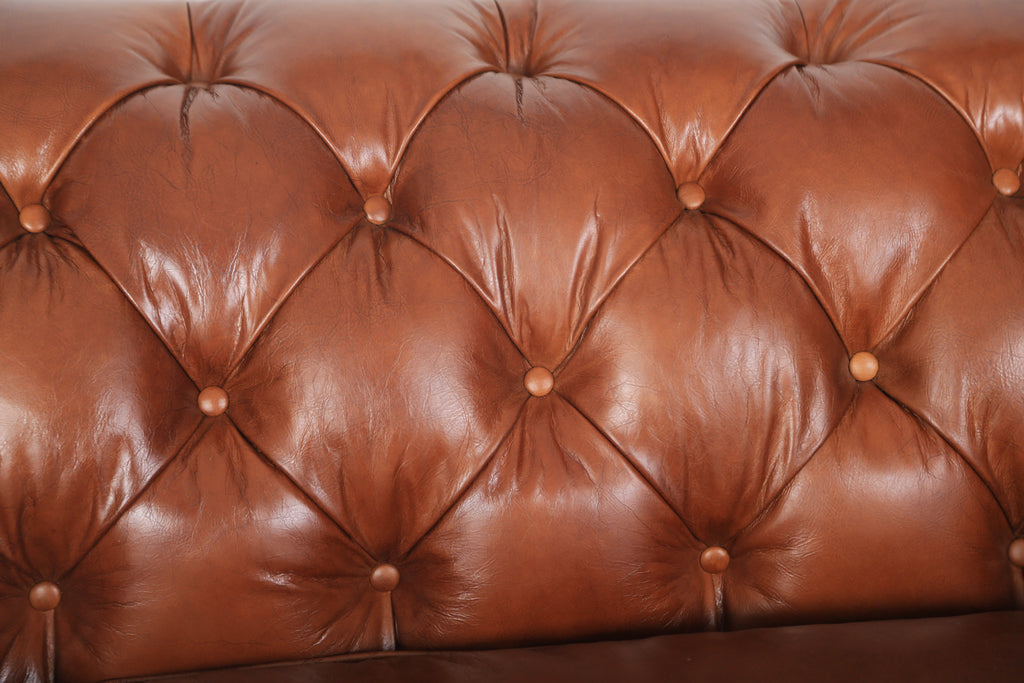 Close-up of the hand-tufted leather back of the Arthur Chesterfield Leather Sofa