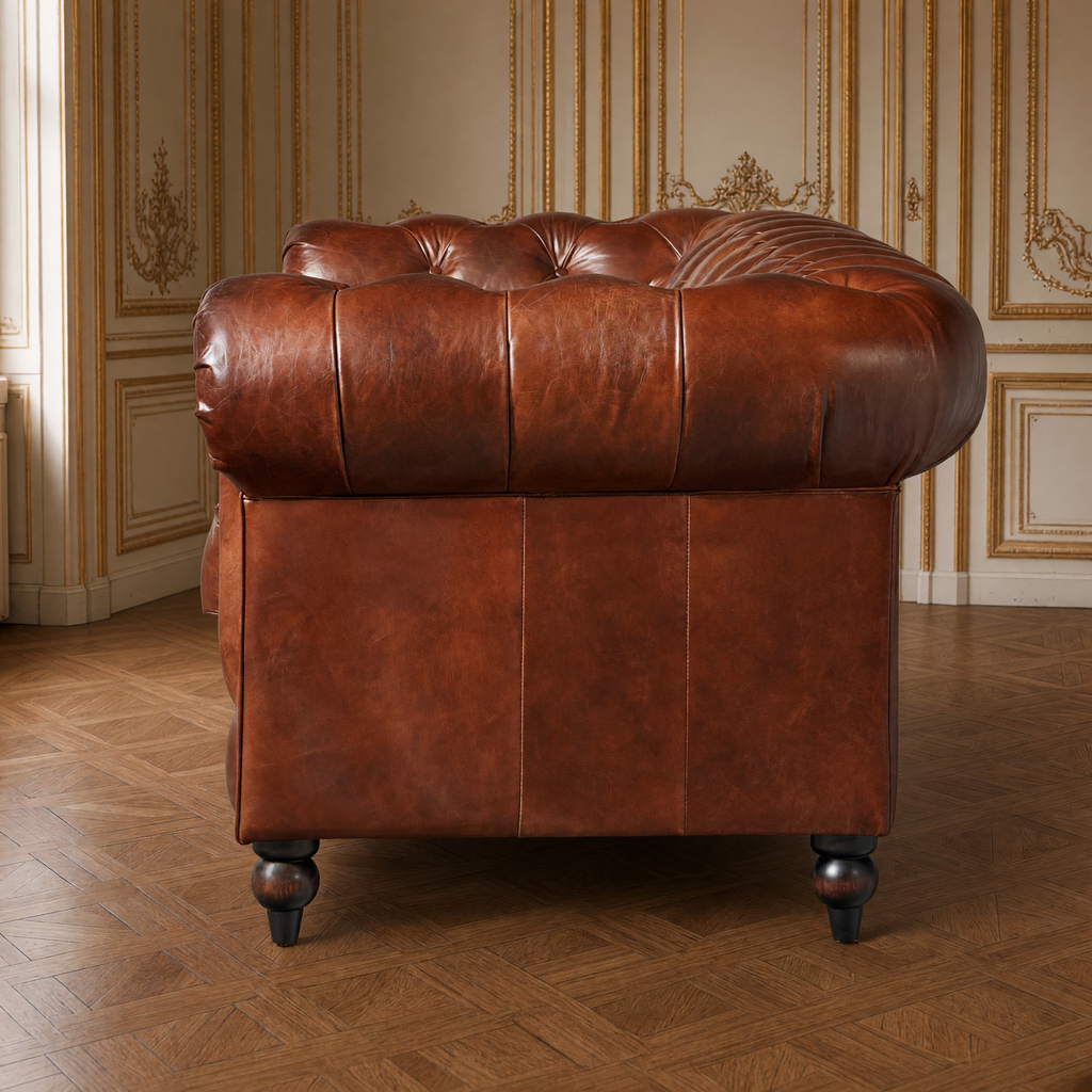 Bromley Chesterfield leather sofa side view of the rolled arm