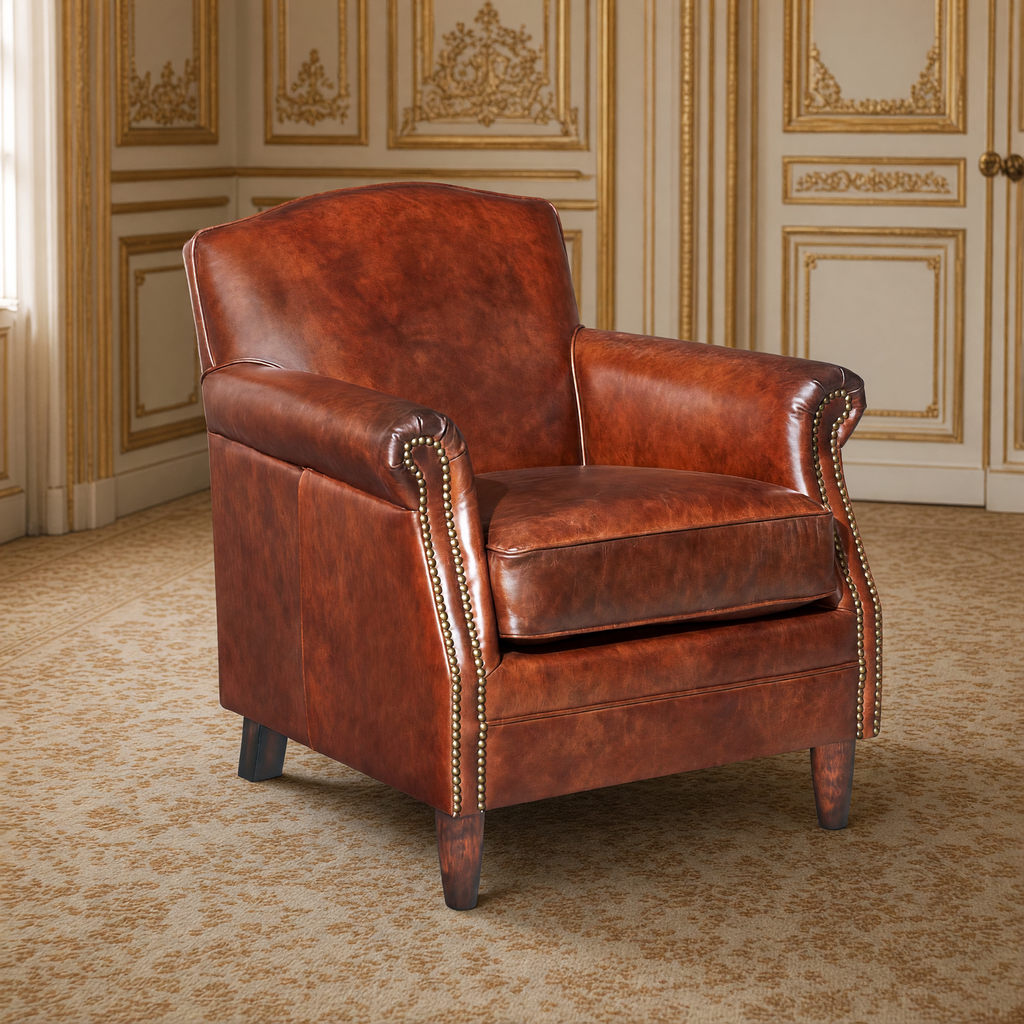 Bromwell leather club chair in Newark Brown in an ivory and gold Louis XVI salon