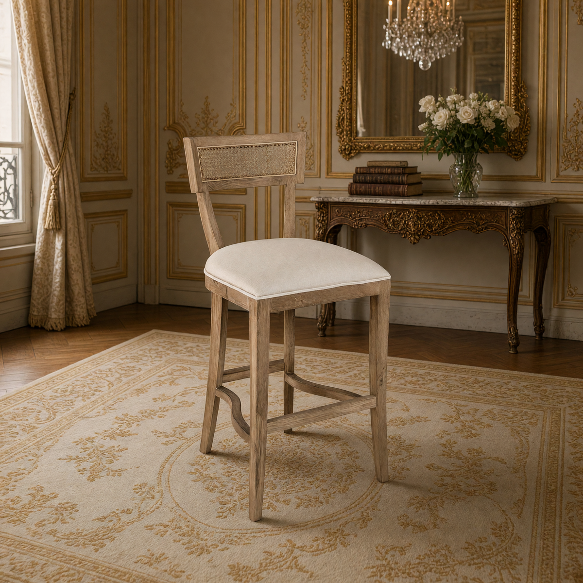 Carvell Cane Back Oak Bar Stool in Natural Linen, Solid Oak, styled in a French salon with a marble-top console and gilded mirror