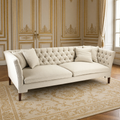 Eileen button-tufted sofa in a greige and gold French boiserie salon