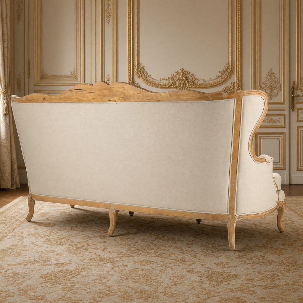 Back view of the Eloy carved elm and linen sofa