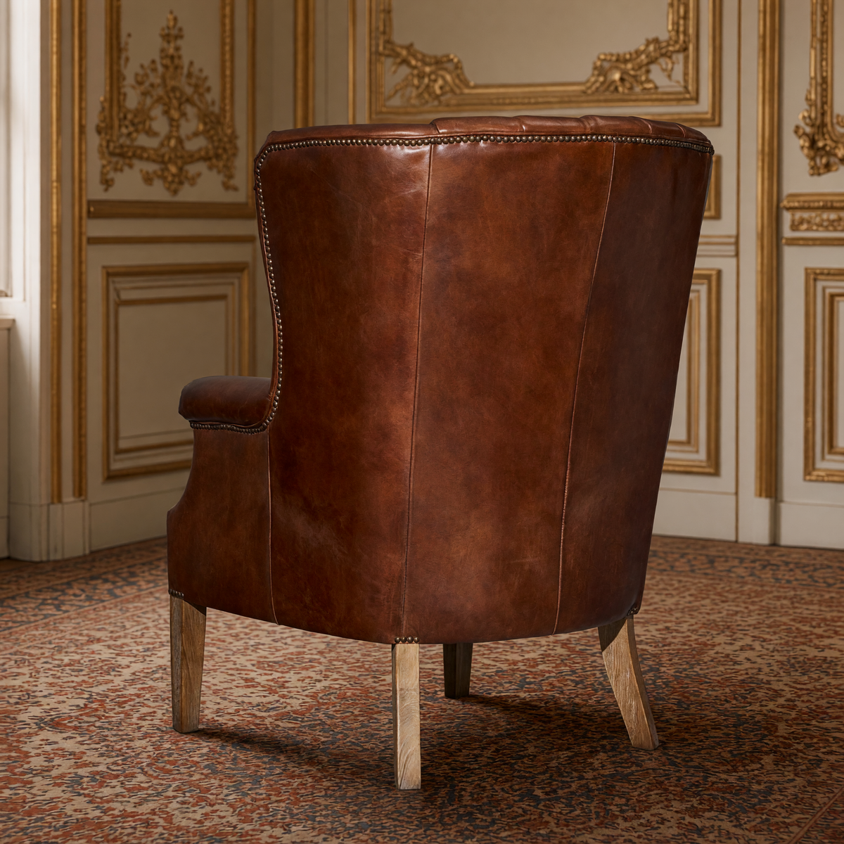 George leather wingback chair, rear three-quarter view