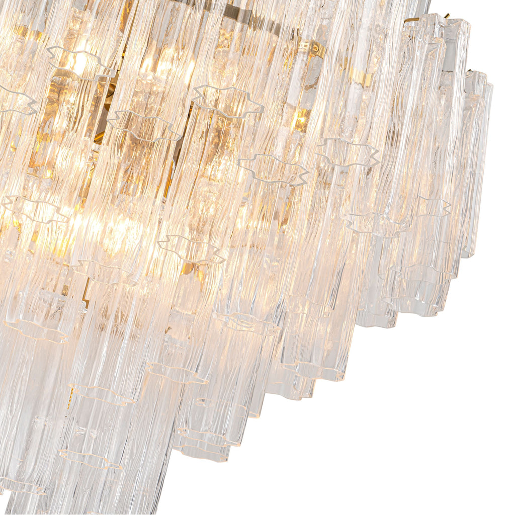 Close-up of the lit lower tiers of clear glass rods of the Glacier Drop Chandelier