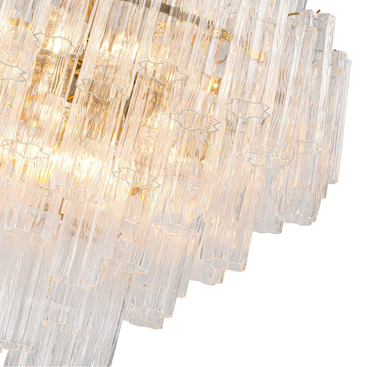 Close-up of the lit lower tiers of clear glass rods of the Glacier Drop Chandelier