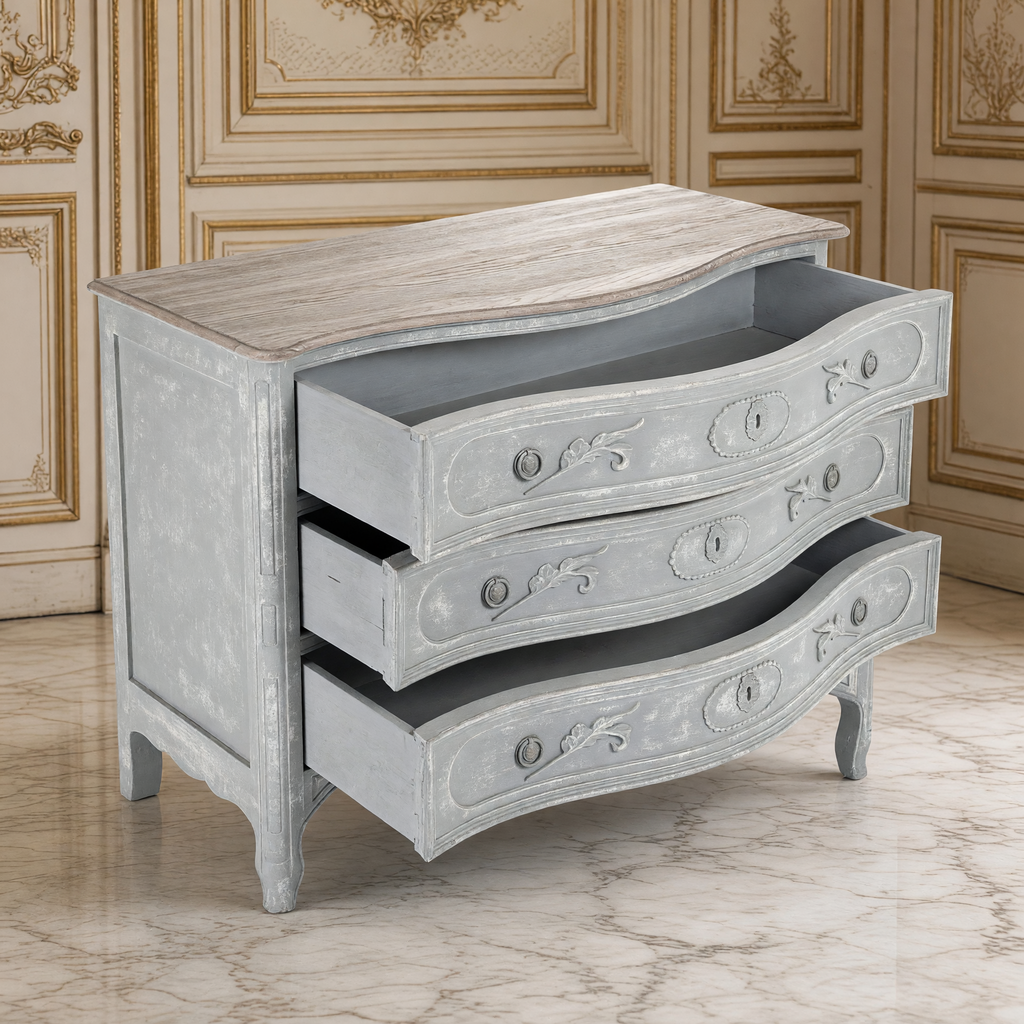 Lennon French Carved Serpentine Chest in Distressed Grey with its three serpentine drawers open