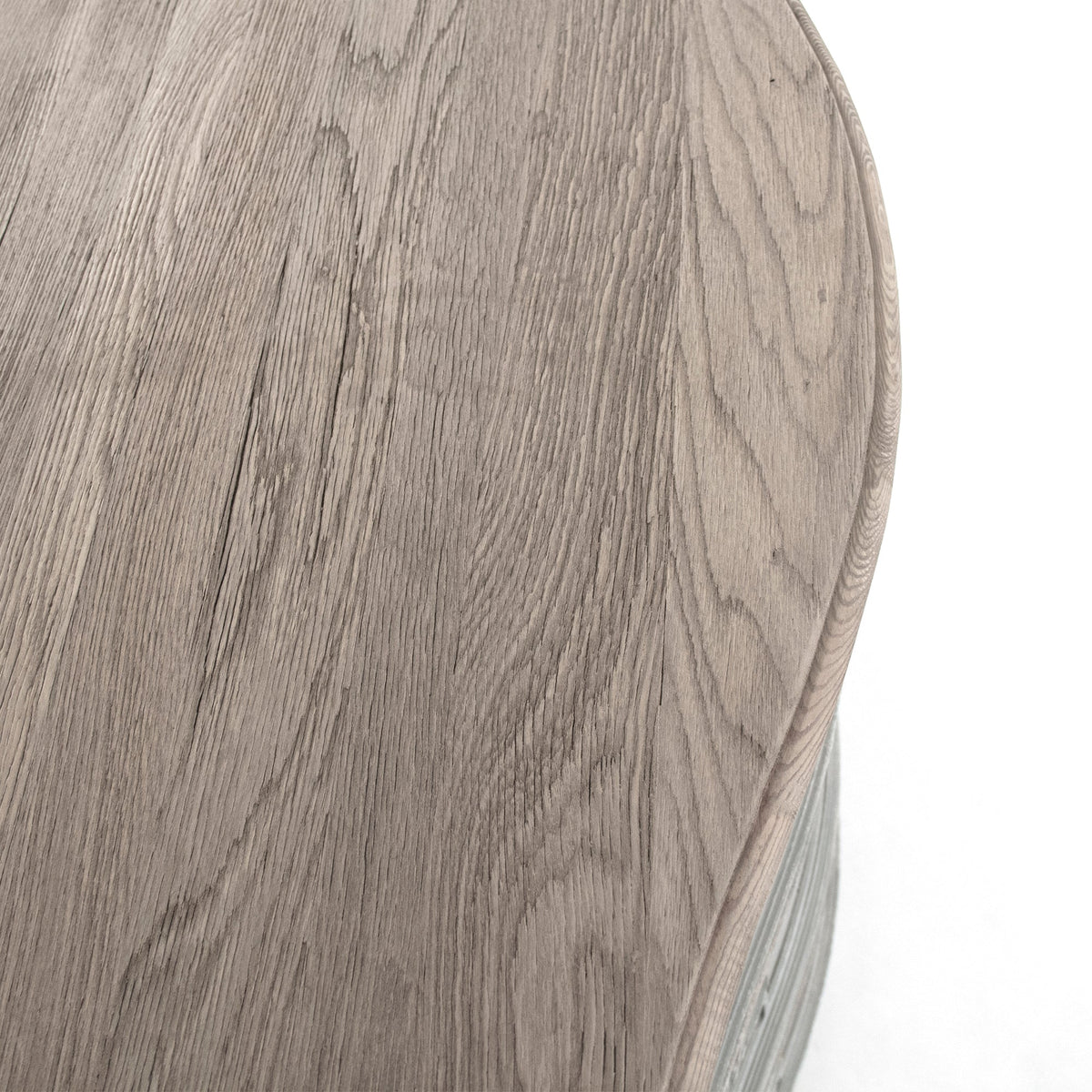 Lennon French Carved Serpentine Chest in Distressed Grey, studio detail photo 4 of 5 of the natural weathered wood top