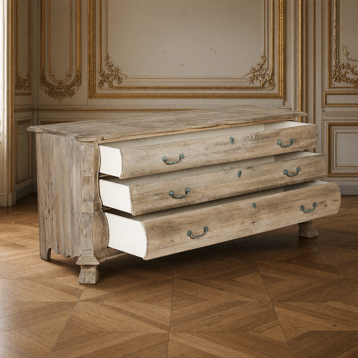 Limoges Bombé Weathered Wood Chest with its three drawers open, in a French boiserie salon