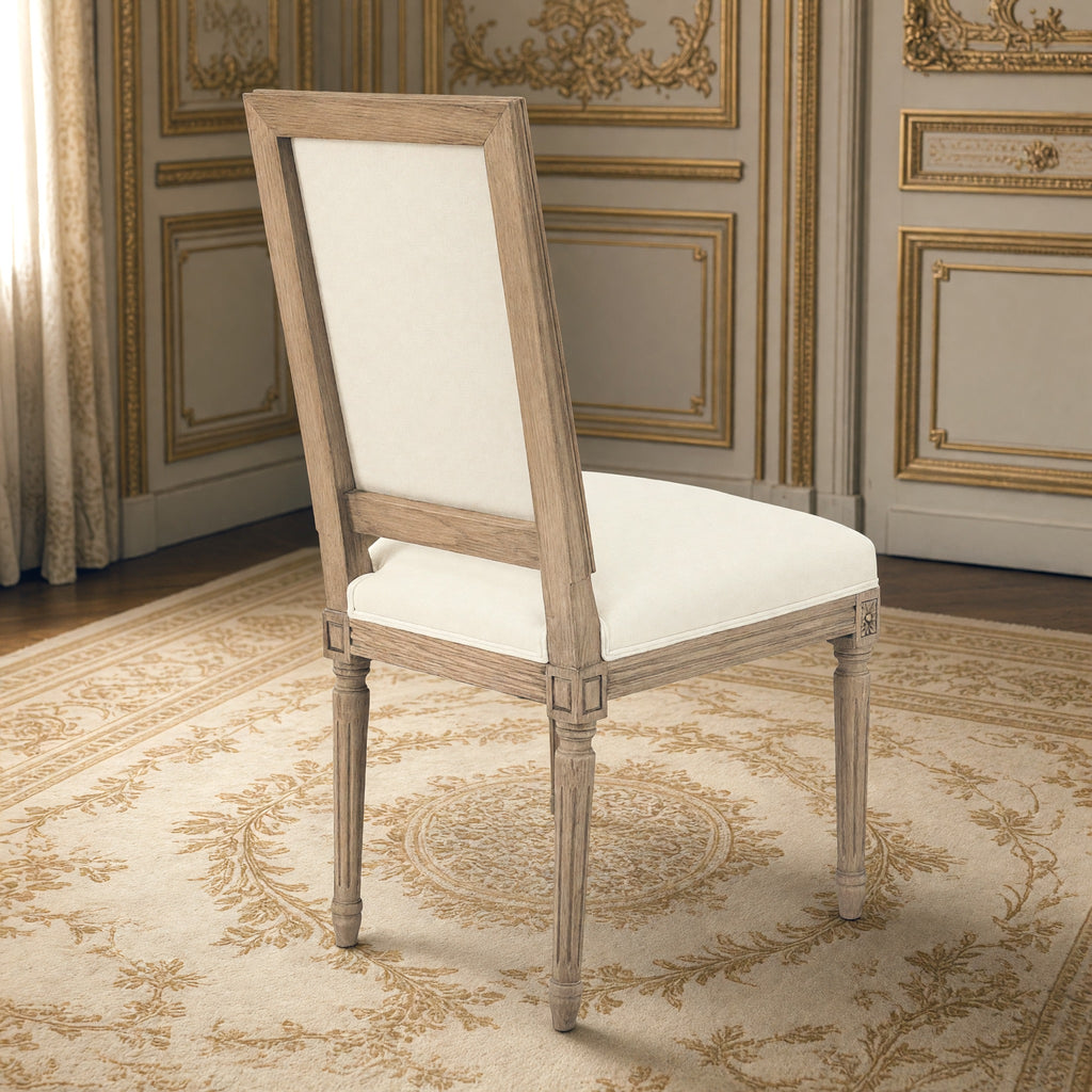 Rear three-quarter view of the Louis square-back side chair in off-white cotton on natural oak