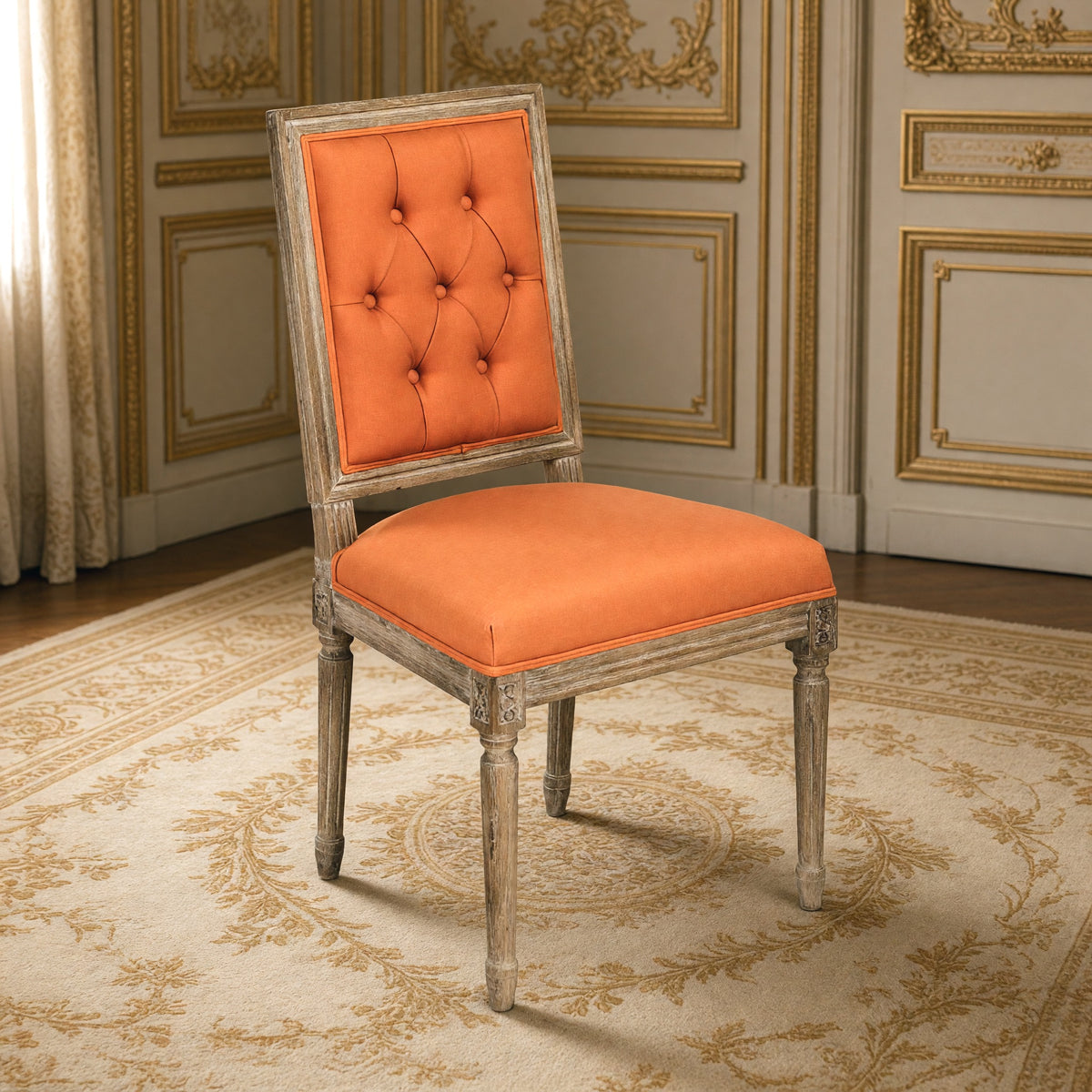 Louis French square-back side chair in orange linen cotton, limed grey oak in a gilded Louis XVI salon on an Aubusson carpet