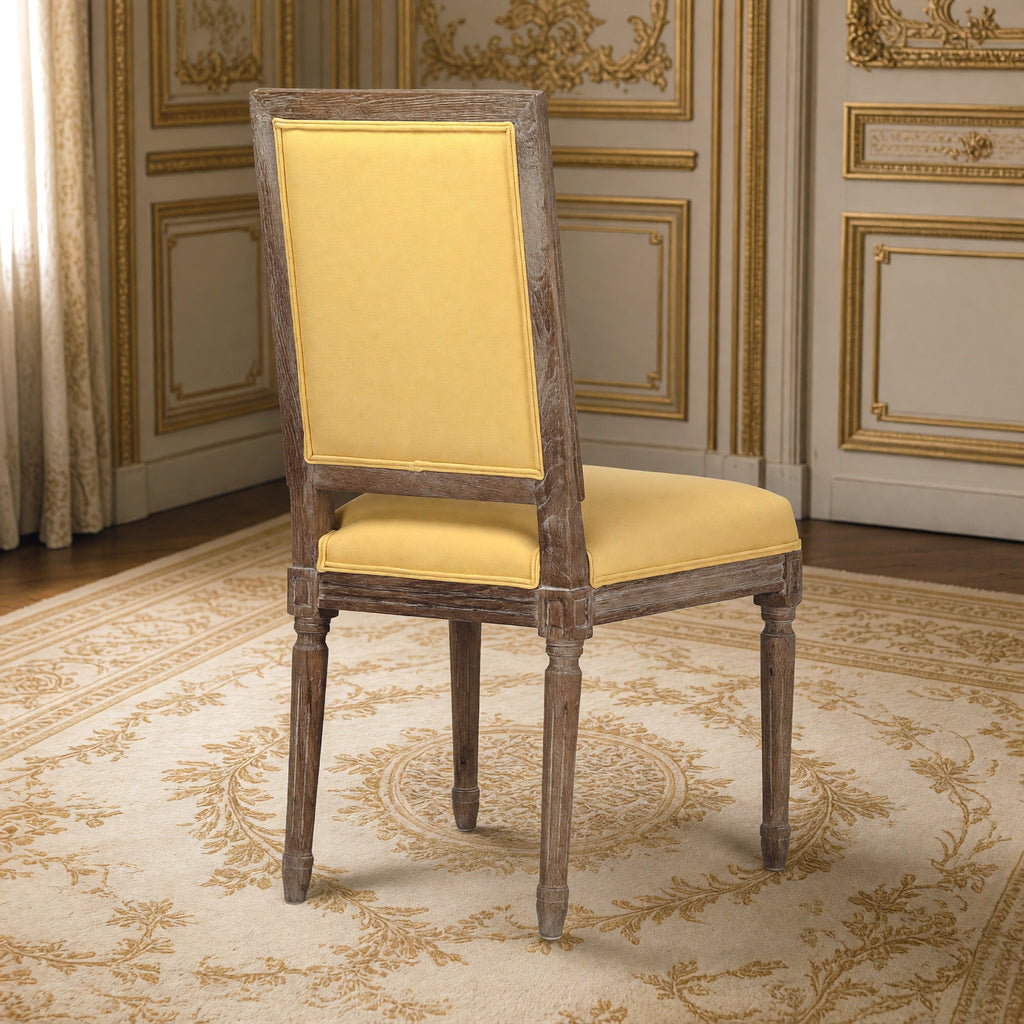 Rear three-quarter view of the Louis square-back side chair in yellow linen cotton on limed grey oak