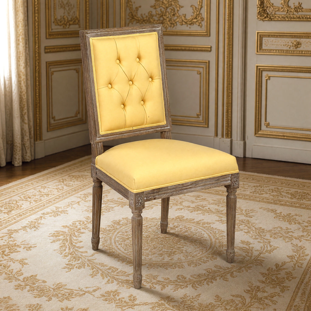 Louis French square-back side chair in yellow linen cotton, limed grey oak in a gilded Louis XVI salon on an Aubusson carpet