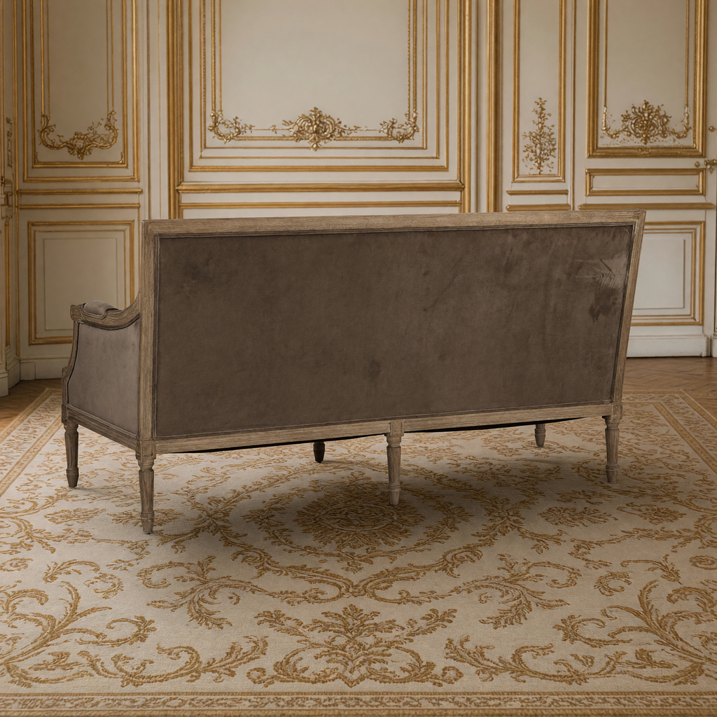 Louis sofa back view showing the velvet back panel and oak frame