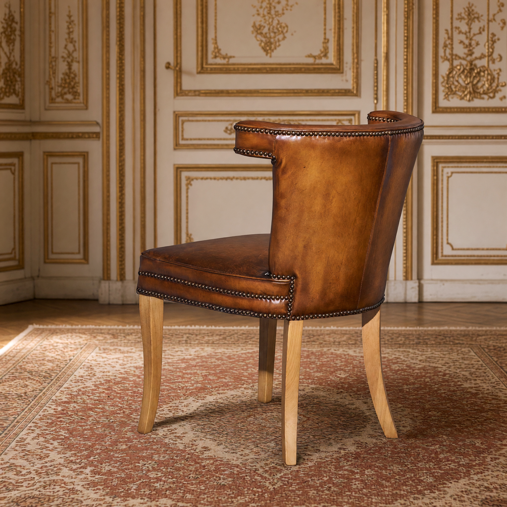 Luca Curved-Back Top-Grain Leather Side Chair in Classic Brown, Mango Wood, rear three-quarter view in a French salon