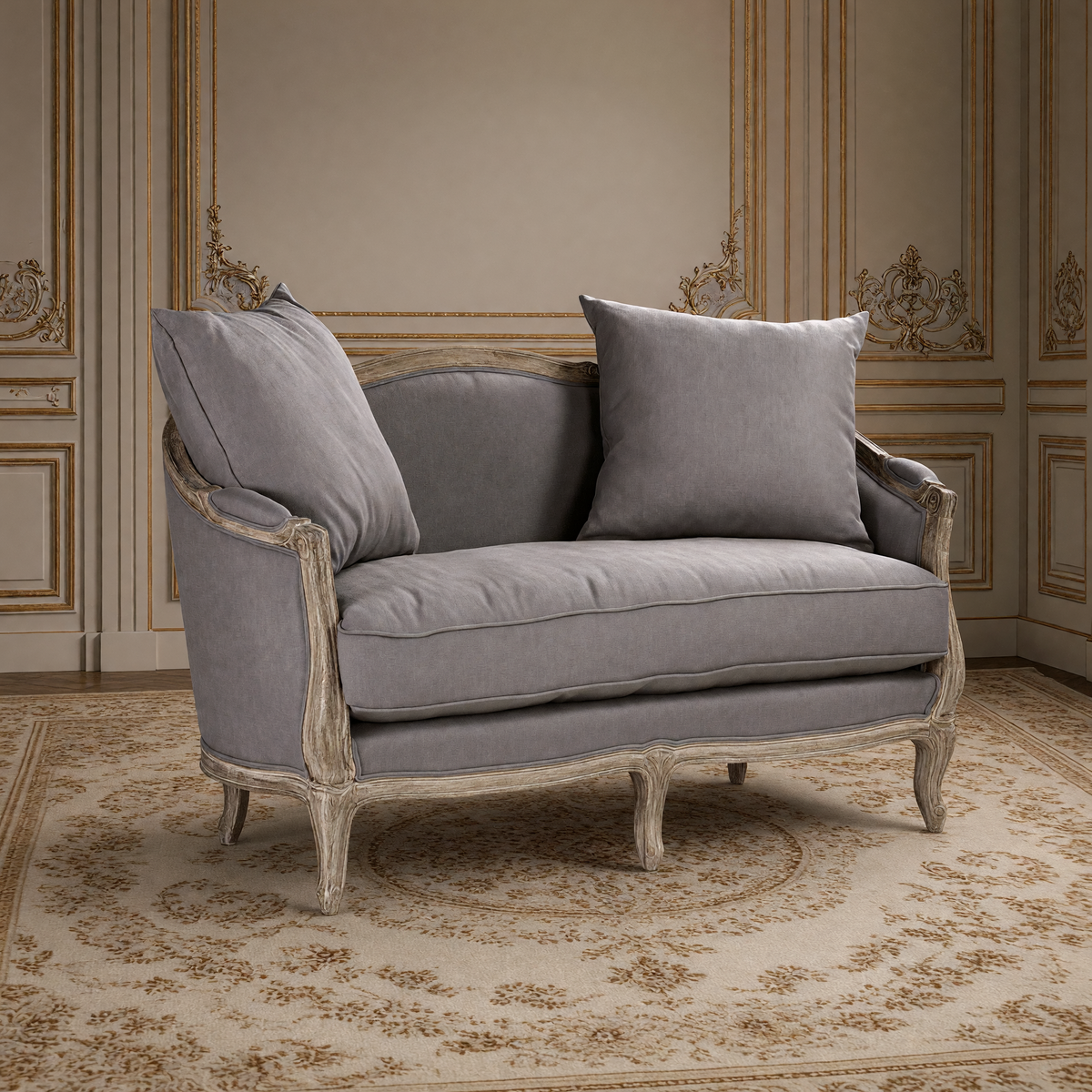 Maison French linen settee in weathered grey linen on a limed oak frame, on an antique Aubusson carpet in a greige and gold salon