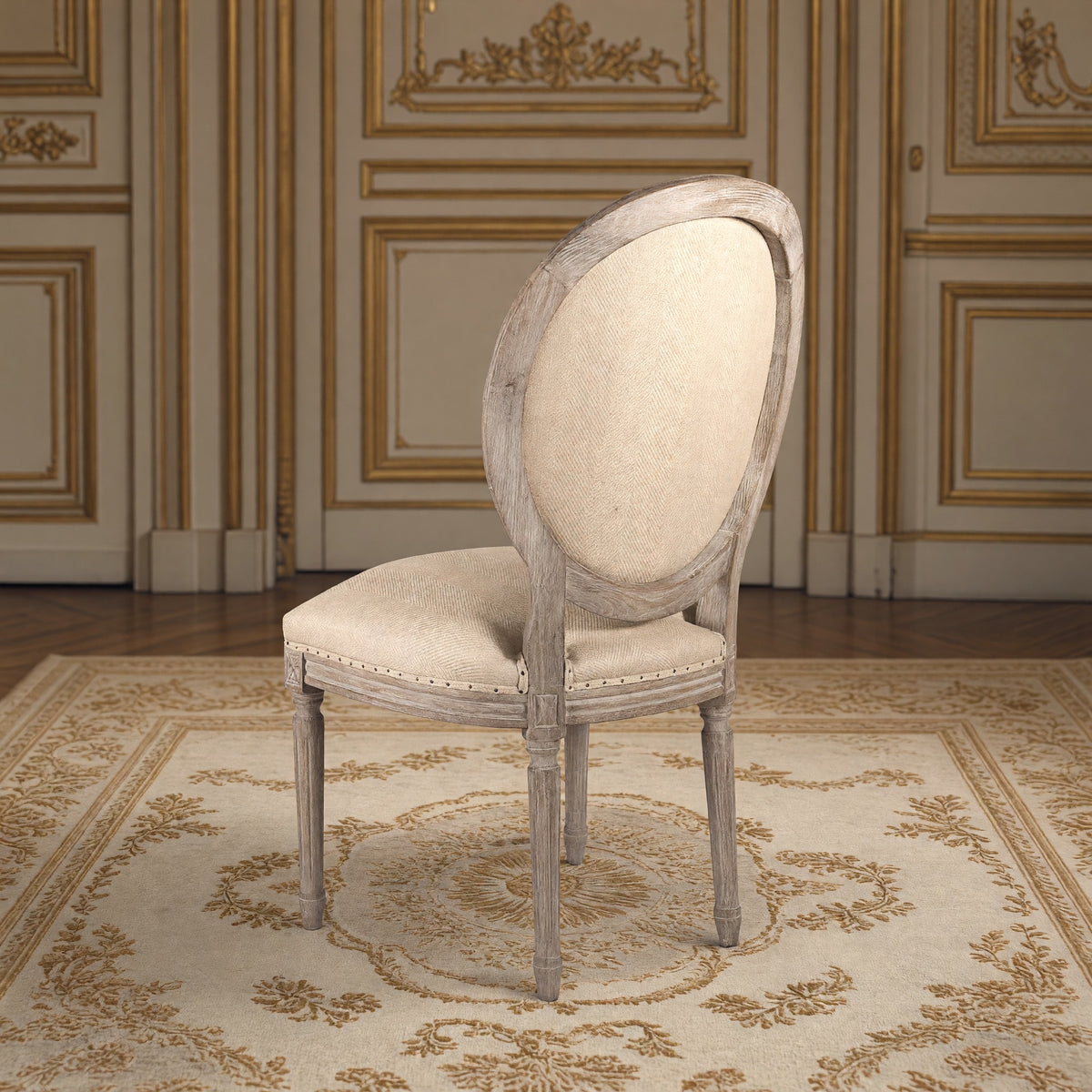 Rear three-quarter view of the Medallion side chair in hemp on limed grey oak