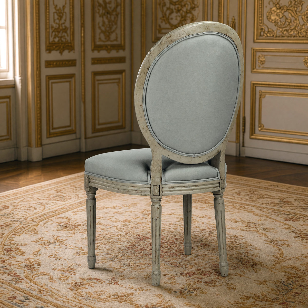 Rear three-quarter view of the Medallion tufted side chair in sage linen on painted birch