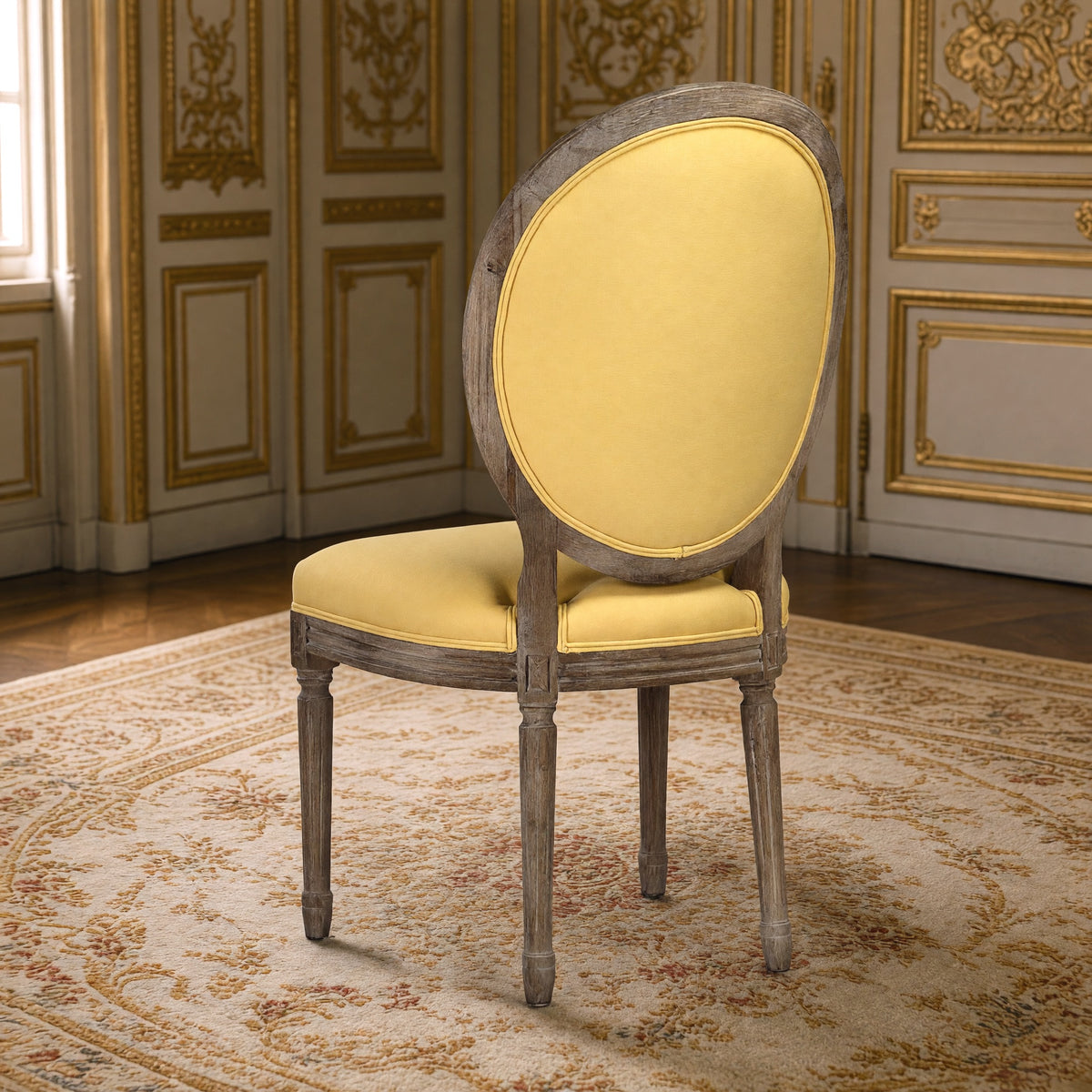 Rear three-quarter view of the Medallion tufted side chair in yellow linen on limed grey oak