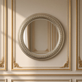 Ecran beaded metal round wall mirror in antiqued silver hanging on a gilded taupe boiserie wall