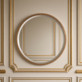 Ania textured iron round wall mirror in warm gold hanging on a gilded greige boiserie wall