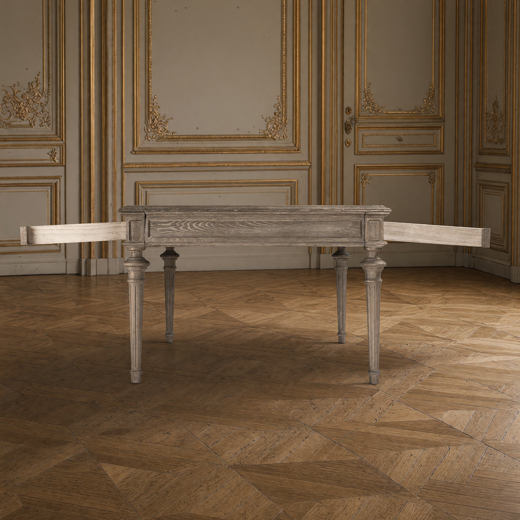 End view of the Nadine Louis XVI Carved Oak Dining Table with both apron drawers pulled open