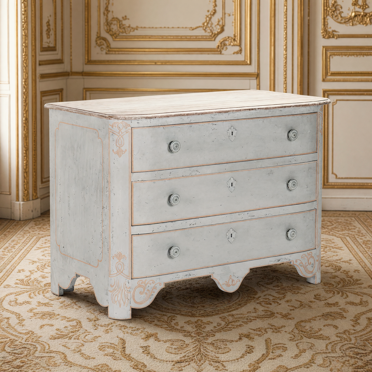 Patric French Painted Elm Chest in Distressed Grey on an antique Aubusson carpet in an ivory and gold French boiserie salon
