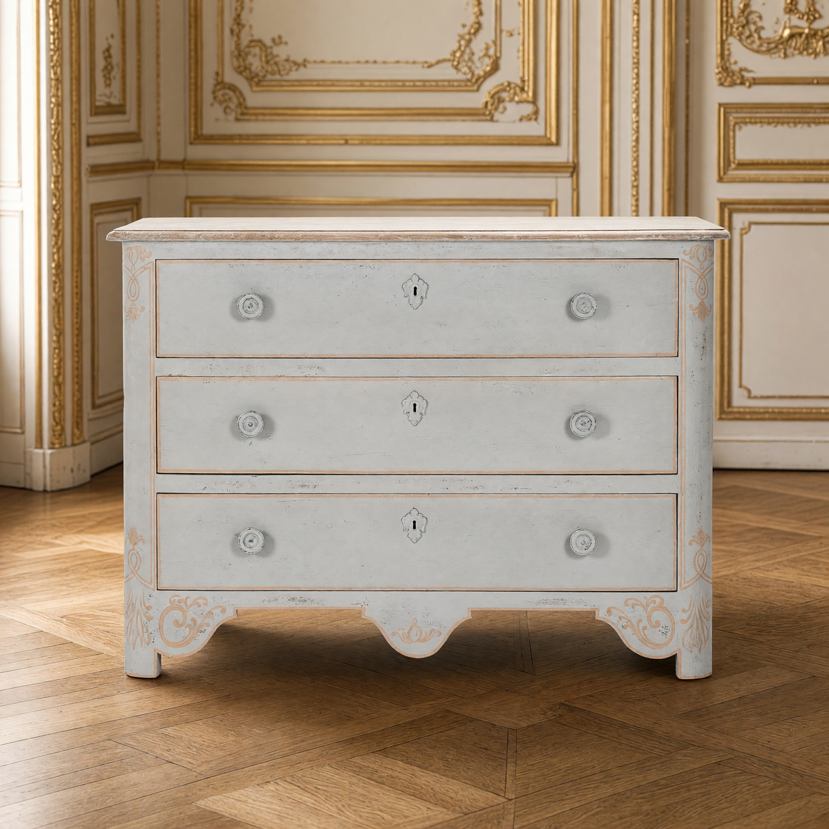 Front view of the Patric French Painted Elm Chest in Distressed Grey in a French boiserie salon