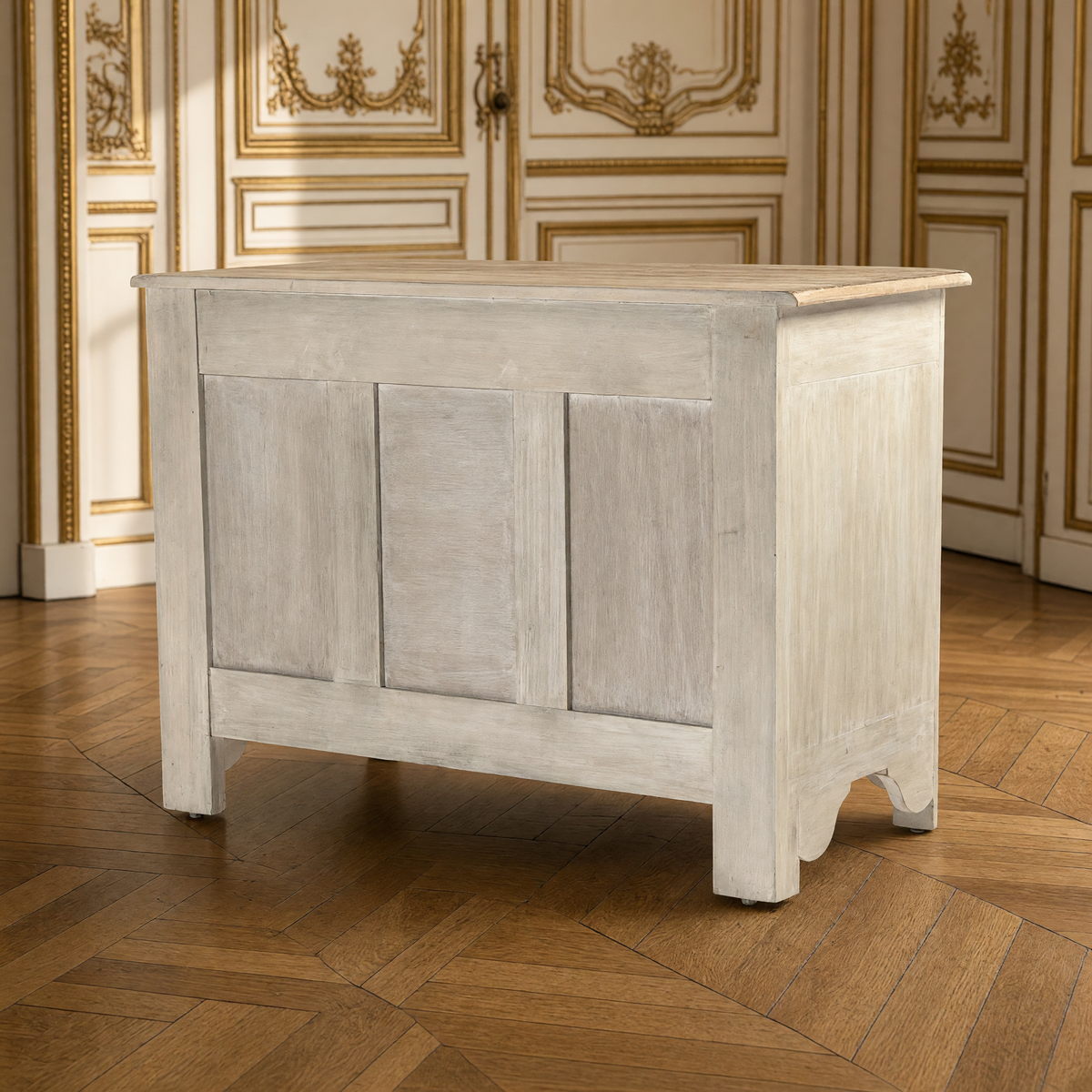 Back view of the Patric French Painted Elm Chest in Whitewash with Natural Top showing the paneled back