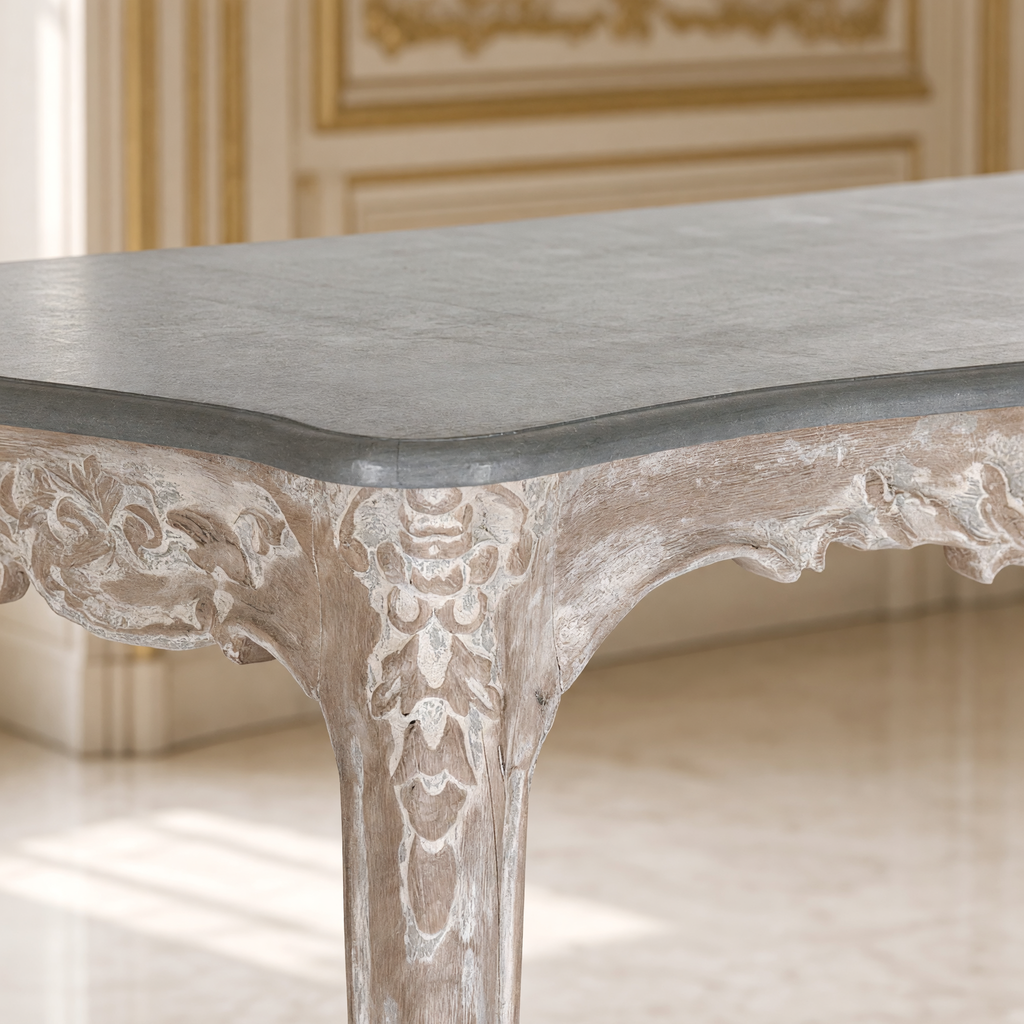 Detail of the Reuben console carved leg and slate-grey top edge