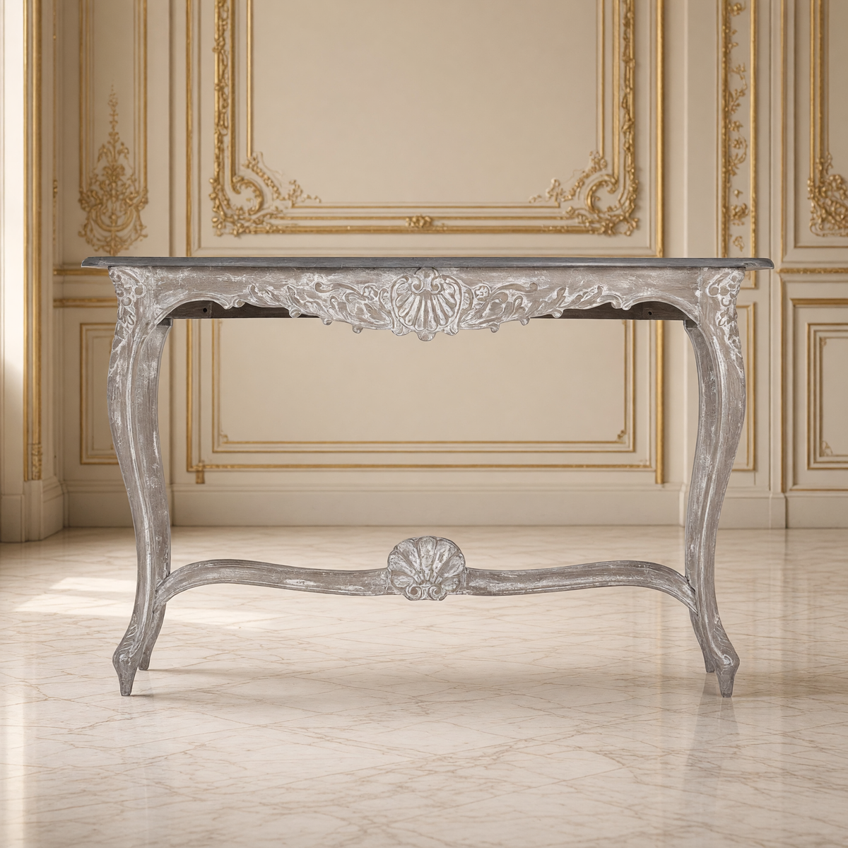 Front view of the Reuben console table showing the carved shell apron and stretcher