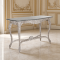 Reuben Louis XV console table with slate-grey top in an ivory and gilded boiserie salon on a cream marble floor