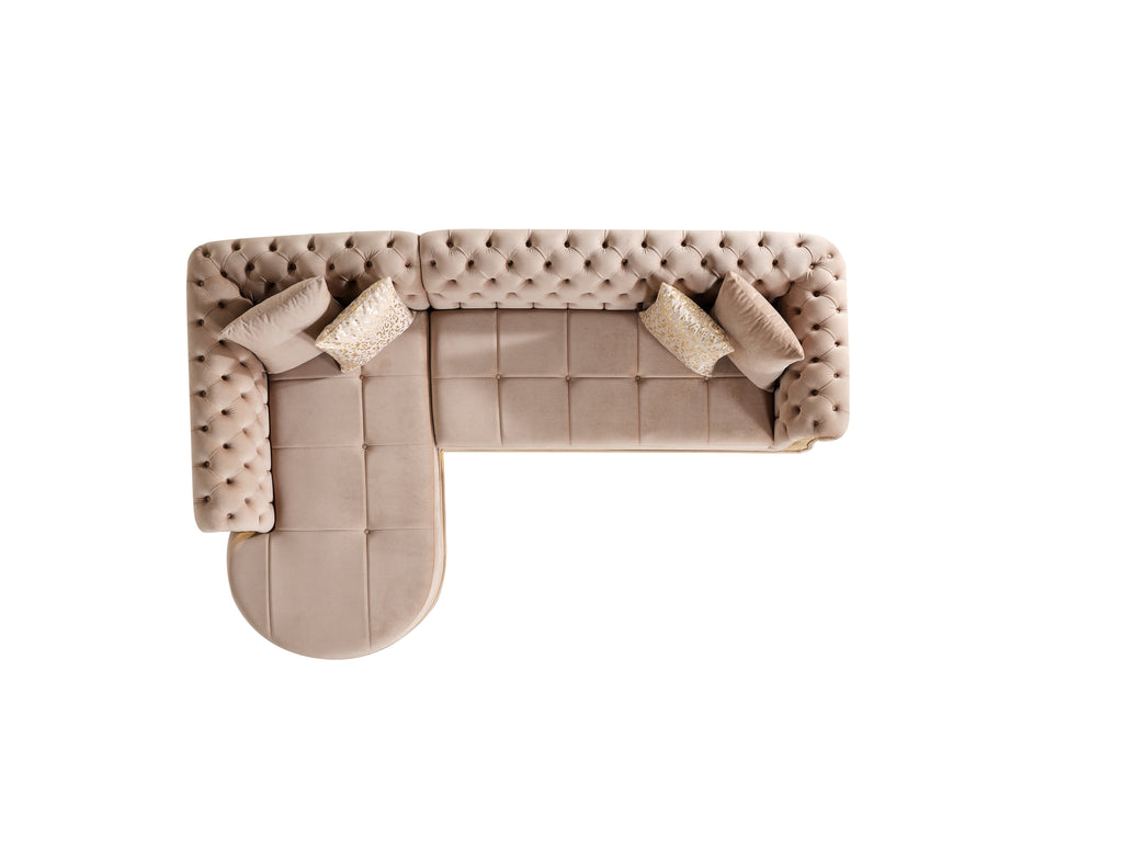 Tufted velvet L-shaped sectional in taupe, top-down view showing chaise layout