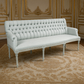 Wendy French Tufted Raw Silk Settee in pale blue in a gilded Louis XVI salon